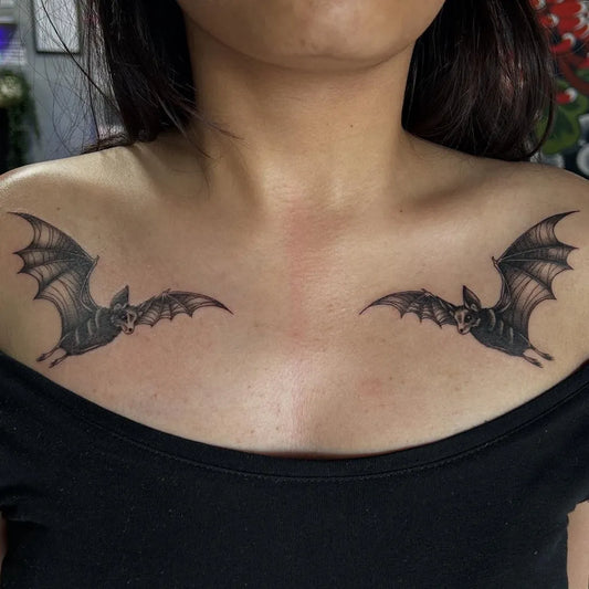 Medium Black and Grey Bats Tattoo on Women Chest by @ellenchelseatattoo