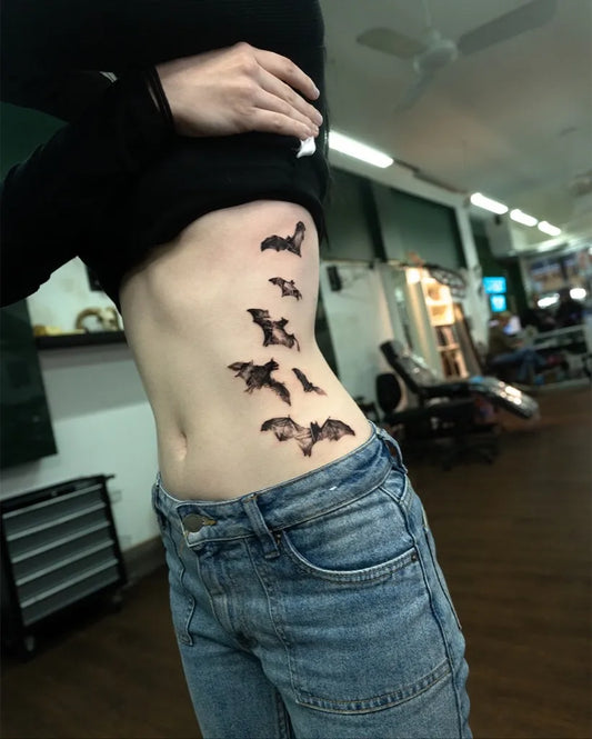 Medium Black and Grey Bats Tattoo on Women Side by @pomade_ink