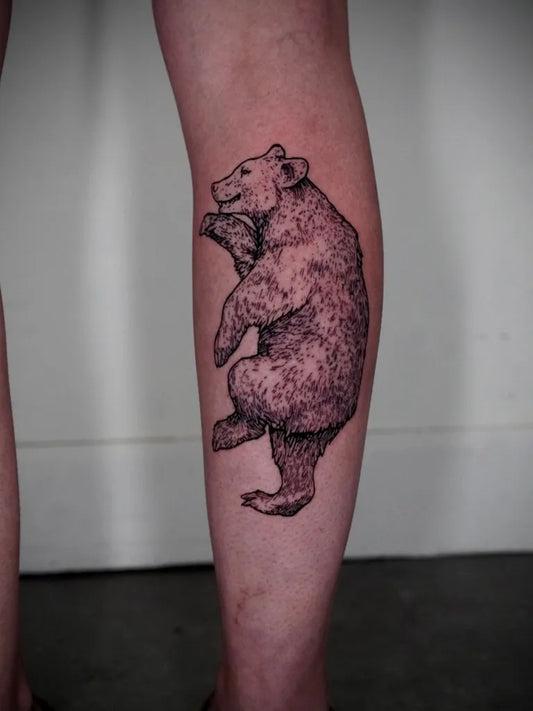 Medium Black and Grey Bear on Women Leg Tattoo by @tillwest.ttt