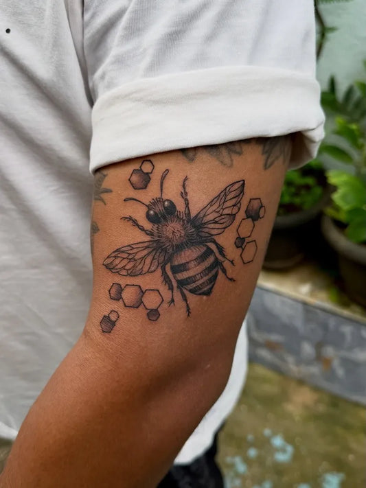Medium Black and Grey Bee and Honeycomb on Men Arm Tattoo by @21tattoostudio