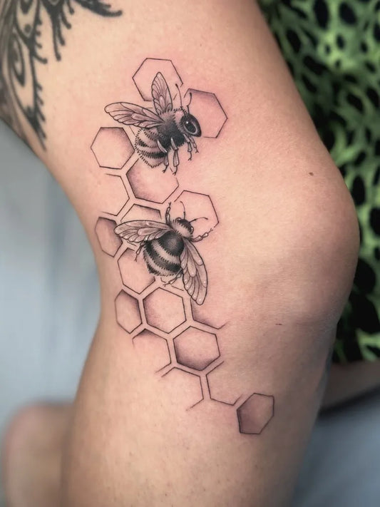 Medium Black and Grey Bees and Honeycomb on Women Thigh Tattoo by @taratattooz