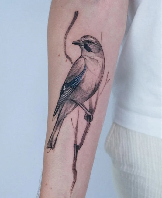Medium Black and Grey Bird and Branch Tattoo on Women Arm by @osmanergin_