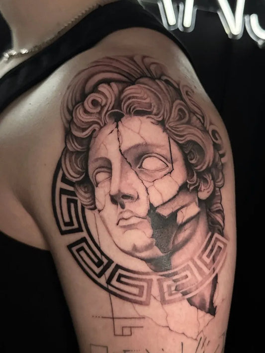 Medium Black and Grey Broken Greek Statue Head Tattoo on Women Shoulder by @raul13tattoos