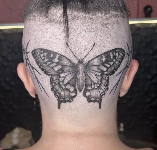 Medium Black and Grey Butterfly Tattoo on Women Head by @redrumtattooparlour
