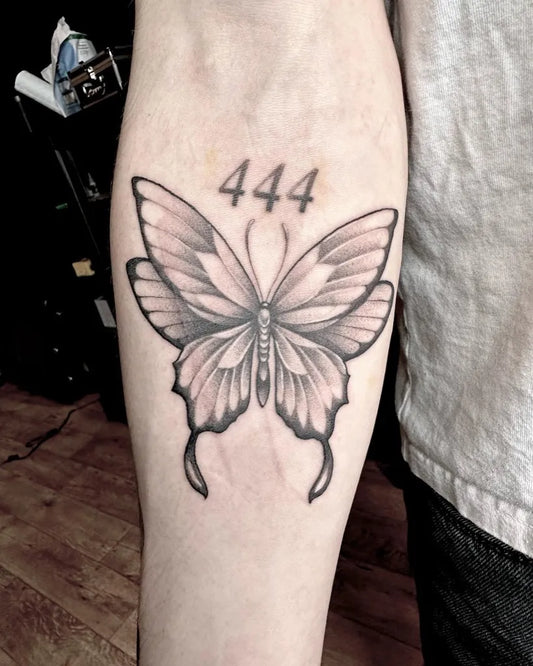 Medium Black and Grey Butterfly with 444 on Women Forearm Tattoo by @sixtysixkink
