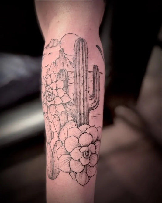 Medium Black and Grey Cactus Mountains Flowers Tattoo on Men Arm by @erkan_tattoo