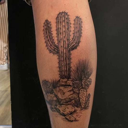 Medium Black and Grey Cactus and Desert Plants Tattoo on Men Leg by @maxx.tattoo