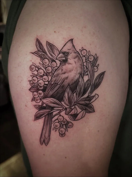 Medium Black and Grey Cardinal with Berries and Leaves Tattoo on Women Arm by @lindsaynohl.tattoo