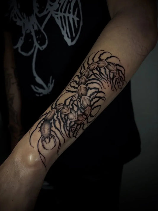 Medium Black and Grey Centipede Tattoo on Men Arm by @11arcane11