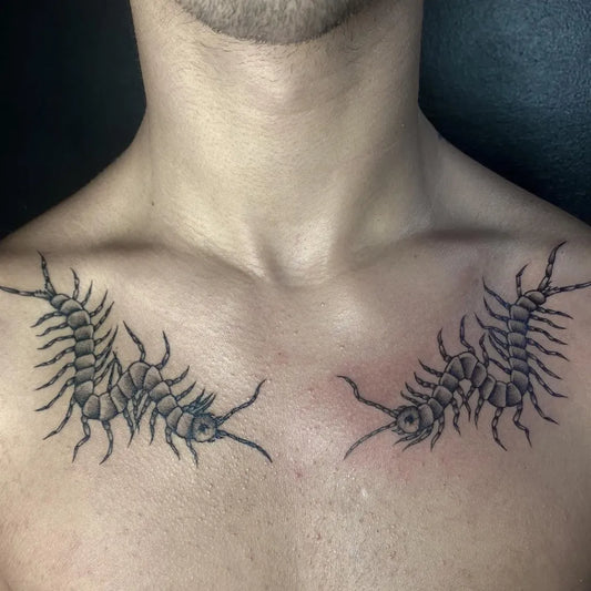 Medium Black and Grey Centipede Tattoo on Men Chest by @calygxra
