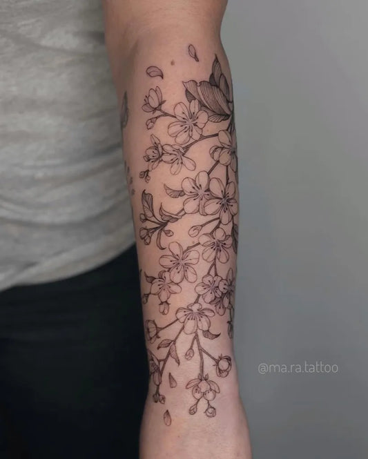 Medium Black and Grey Cherry Blossom Branch on Women Arm Tattoo by @ma.ra.tattoo