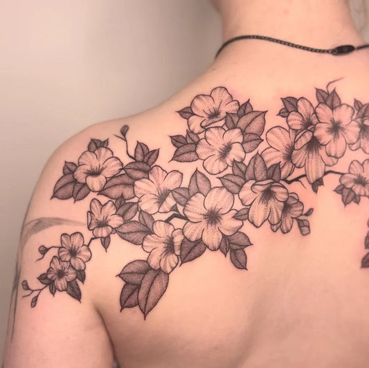 Medium Black and Grey Cherry Blossom Branches on Women Shoulder Tattoo by @beth.tattoo