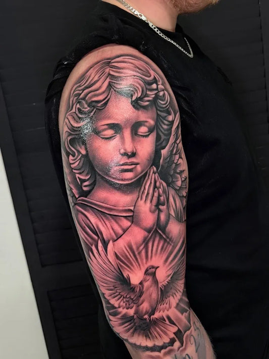 Medium Black and Grey Cherub and Dove Tattoo on Men Arm by @jaydentattoos