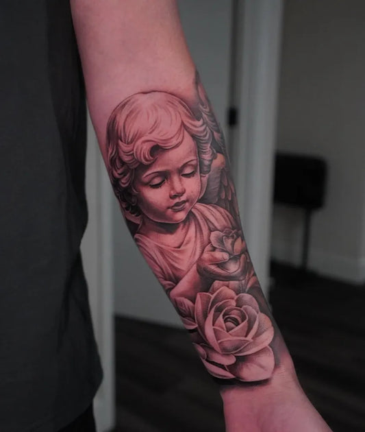 Medium Black and Grey Cherub and Rose Tattoo on Men Arm by @16th.rich
