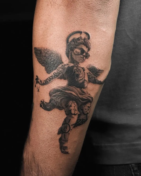 Medium Black and Grey Cherub with Sunglasses Tattoo on Men Arm by @levismake