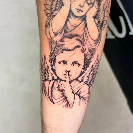 Medium Black and Grey Cherub with Wings Tattoo on Men Arm by @ink.kage
