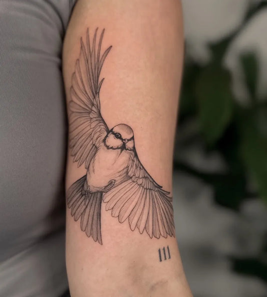 Medium Black and Grey Chickadee Bird Tattoo on Women Arm by @birdsofparadise.ink