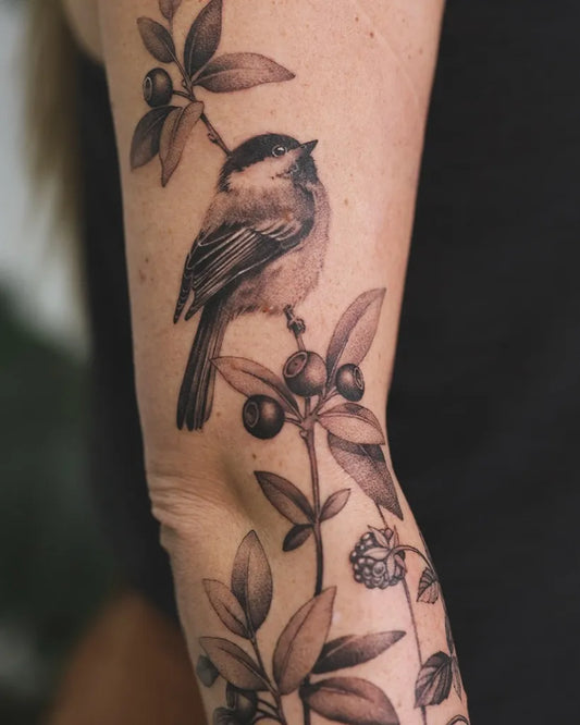 Medium Black and Grey Chickadee and Berries Tattoo on Women Arm by @picsola