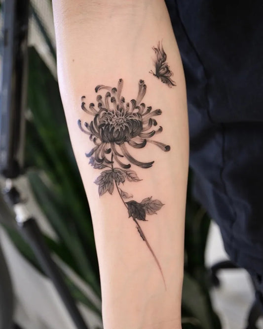 Medium Black and Grey Chrysanthemum and Butterfly Tattoo on Women Arm by @baronarttattoo