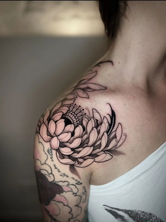 Medium Black and Grey Chrysanthemum with Crown Tattoo on Women Shoulder by @creaaxelle