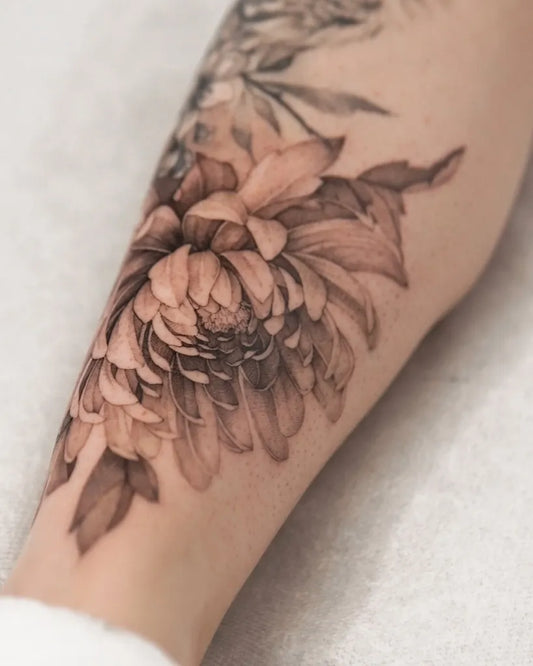 Medium Black and Grey Chrysanthemum with Leaves Tattoo on Women Arm by @zszywka_tattooing