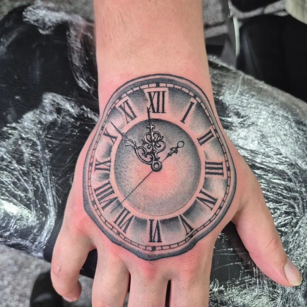 Medium Black and Grey Clock Tattoo on Men Wrist by @empiretattoo53