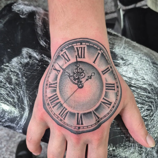 Medium Black and Grey Clock Tattoo on Men Wrist by @empiretattoo53