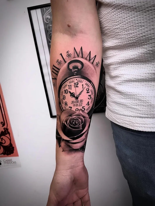 Medium Black and Grey Clock and Rose Tattoo on Men Arm by @ptiloutattoo