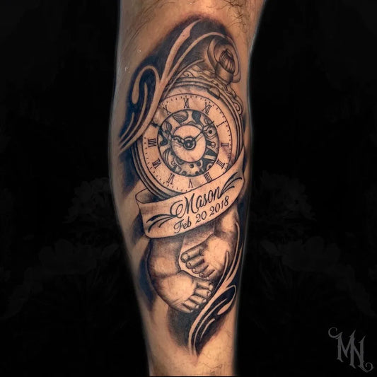 Medium Black and Grey Clock with Baby Ribbon Tattoo on Men Leg by @timeless.saint