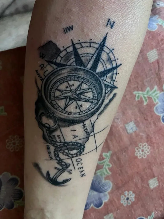 Medium Black and Grey Compass Anchor Map Tattoo on Men Arm by @niall_tattoz