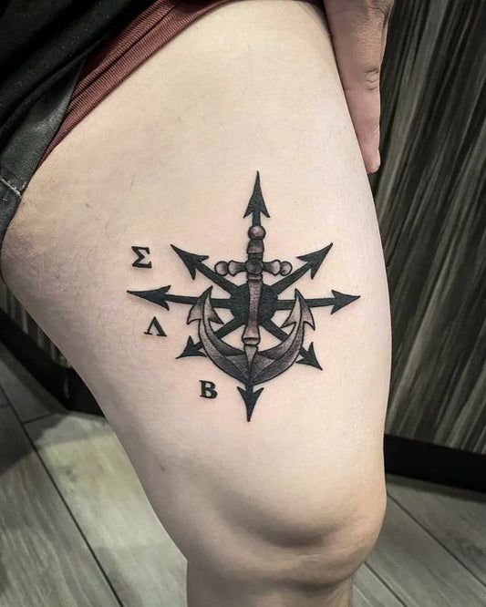 Medium Black and Grey Compass Anchor Nautical Tattoo on Women Thigh by @inkedlv