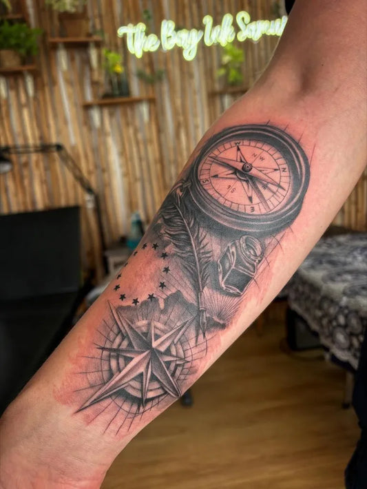 Medium Black and Grey Compass Rose with Map on Men Arm Tattoo by @thebayinksamui