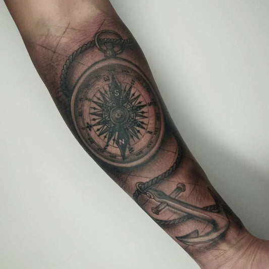 Medium Black and Grey Compass and Anchor Nautical Tattoo on Men Arm by @eleyyyy_