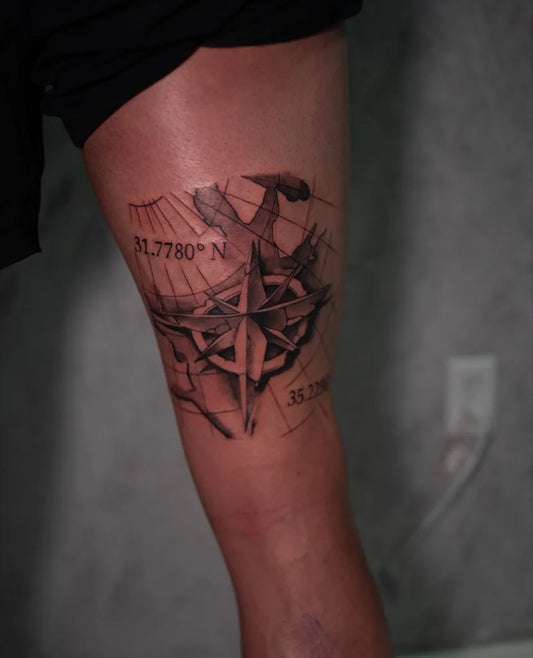 Medium Black and Grey Compass with Map Coordinates on Men Arm Tattoo by @inkbydame