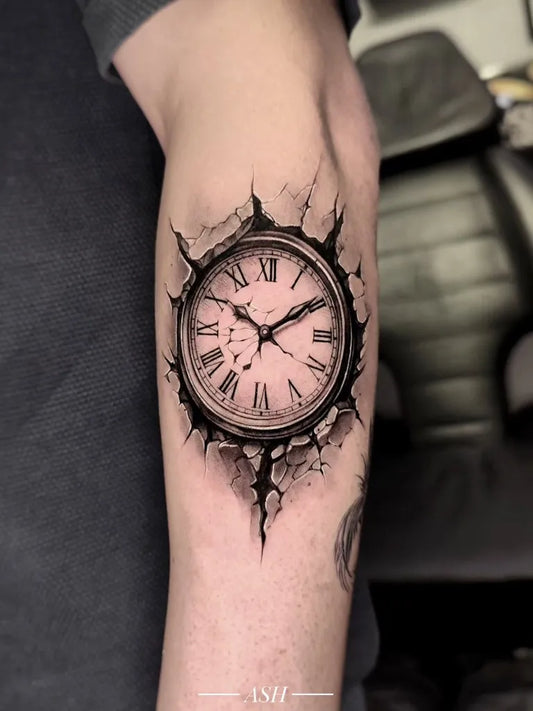 Medium Black and Grey Cracked Clock Tattoo on Men Arm by @ashtatto