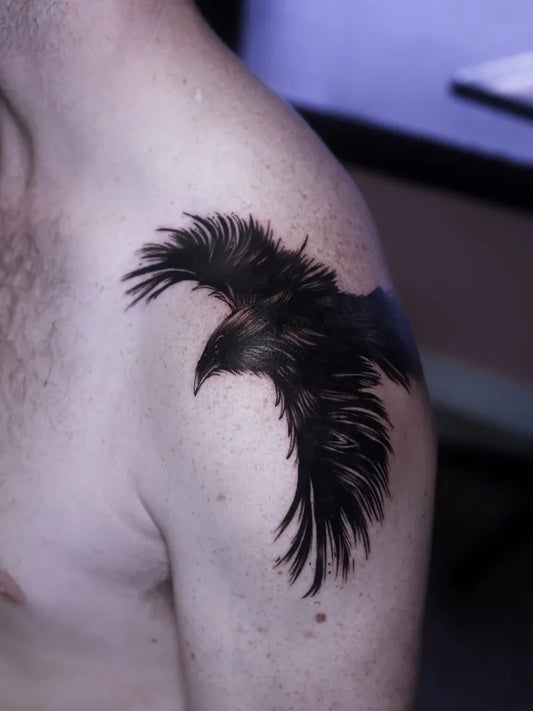 Medium Black and Grey Crow Tattoo on Men Shoulder by @zuxgos