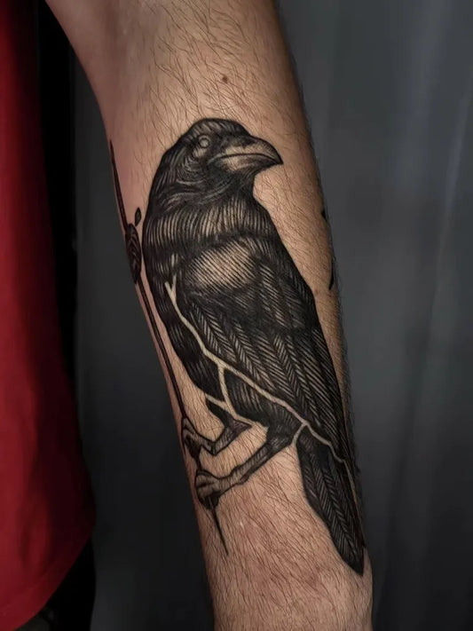 Medium Black and Grey Crow with Rose Tattoo on Men Arm by @vondetattoo