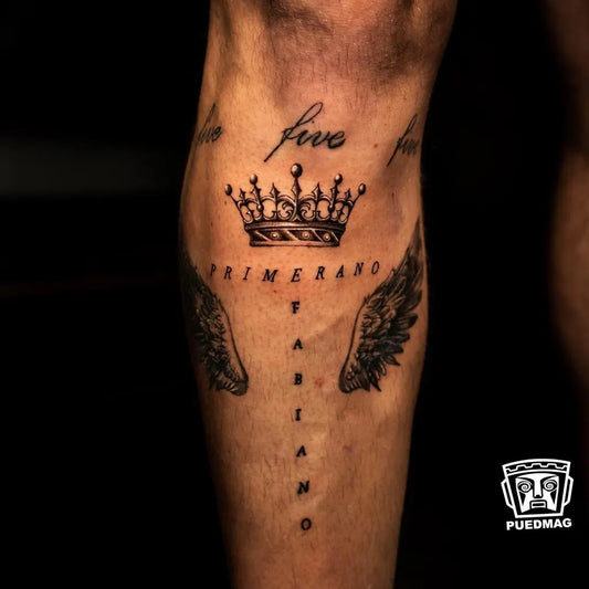 Medium Black and Grey Crown with Wings and Script Tattoo on Men Thigh by @locorex_tattoo
