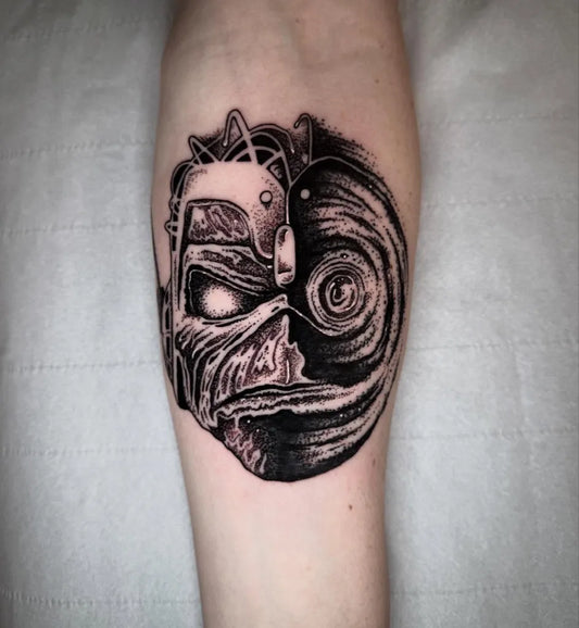 Medium Black and Grey Cyborg Face Music Tattoo on Men Arm by @hollihorrortattoos