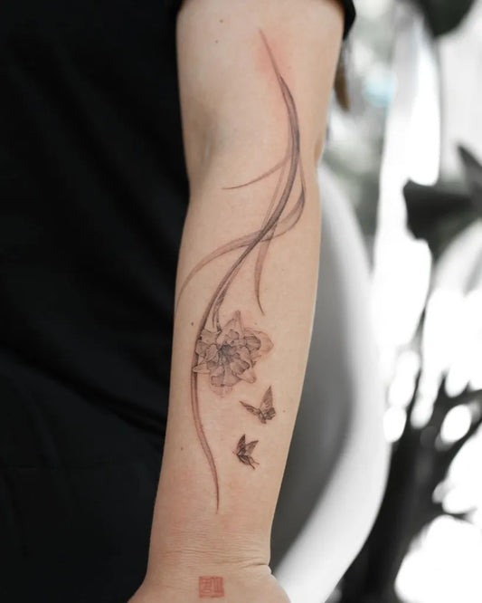 Medium Black and Grey Daffodil and Butterflies Tattoo on Women Arm by @tokki.ttt