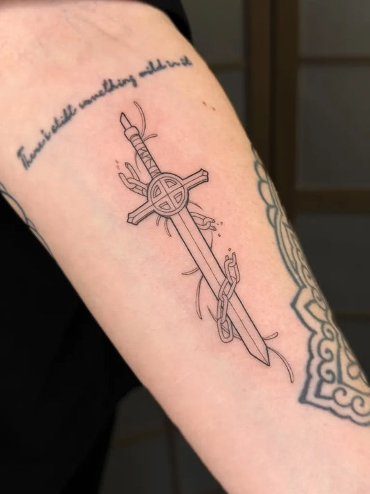 Medium Black and Grey Dagger Cross and Vines Tattoo on Women Arm by @heidikayetattoo