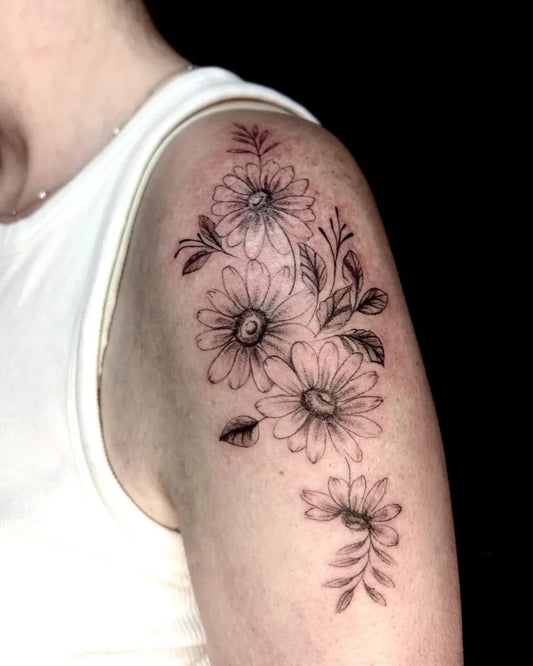 Medium Black and Grey Daisy Flowers Tattoo on Women Shoulder by @ajltattoos