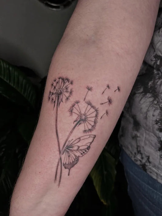 Medium Black and Grey Dandelion and Butterfly Tattoo on Women Arm by @mir0sine