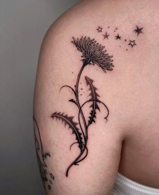 Medium Black and Grey Dandelion with Stars Tattoo on Women Shoulder by @inkbynotyet