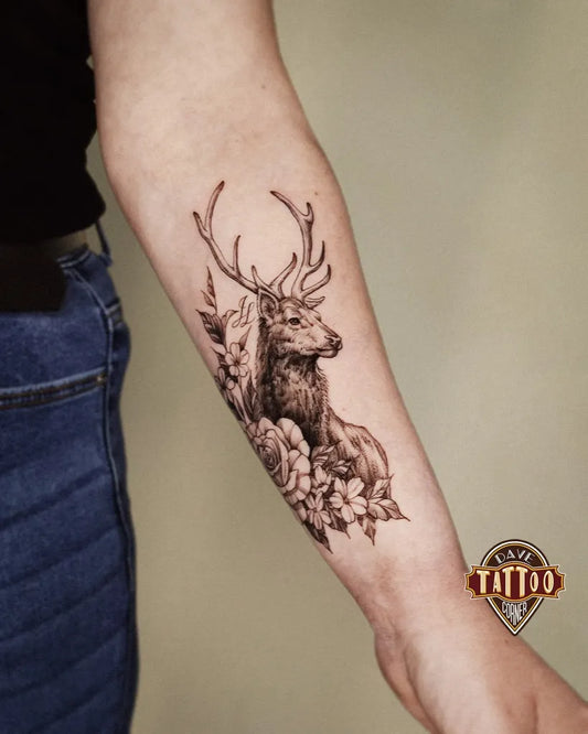 Medium Black and Grey Deer and Flowers Tattoo on Women Arm by @dave_tattoo_corner