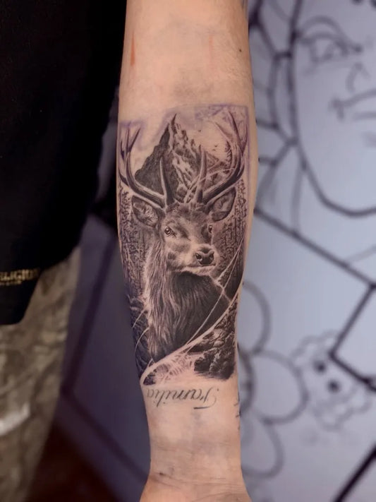 Medium Black and Grey Deer and Mountain Tattoo on Men Arm by @zealous_ink
