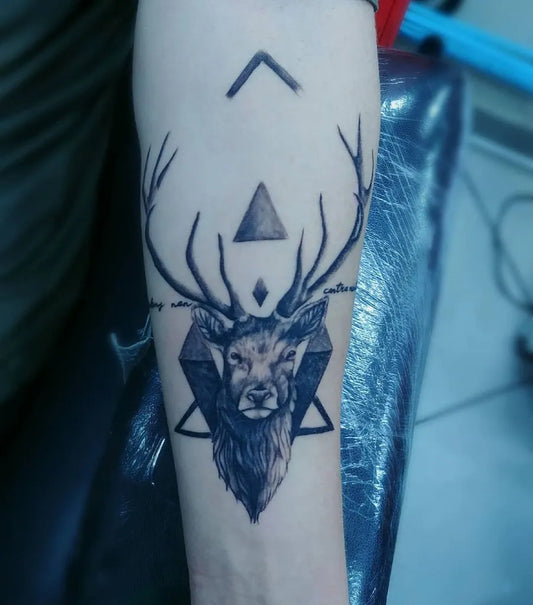 Medium Black and Grey Deer with Geometric Triangle Tattoo on Men Arm by @prismatattoo