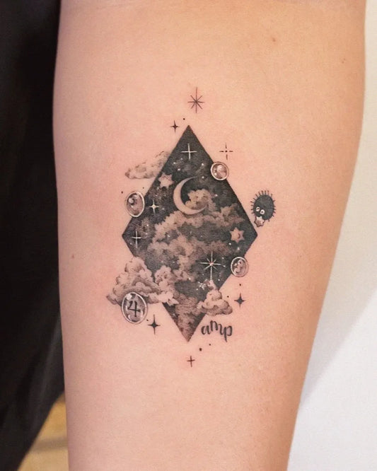 Medium Black and Grey Diamond Cloud Skull Tattoo on Women Arm by @siihee.tattoo