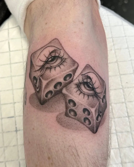 Medium Black and Grey Dice Tattoo on Men Arm by @anikalukinstattoo