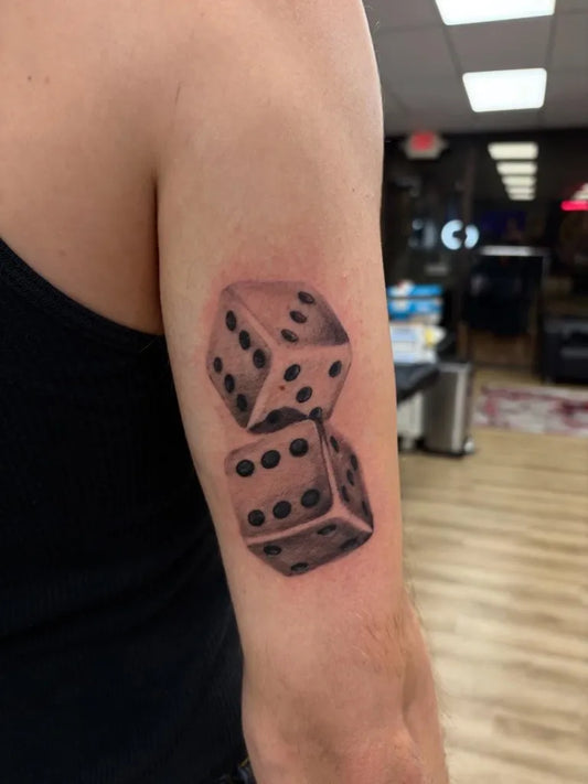 Medium Black and Grey Dice Tattoo on Men Arm by @nickanthonytattoo